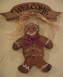 Wooden Gingerbread Man Welcome Sign in Oswego, Illinois